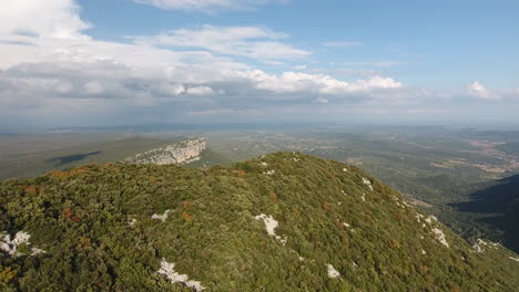 Flying-over-the-summit-of-Pic-Saint-Loup-mountain-and-discovering-a-valley.